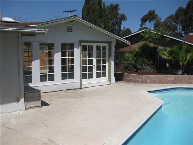 12543 Taunt Road Poway, CA 92064 - Photo 16 of 22 These french doors and windows leads to the very nice family room.