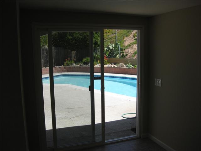 12543 Taunt Road Poway, CA 92064 - Photo 17 of 22 This is an entry to the pool area, from the 'extra' room complete wiht a new slider.
