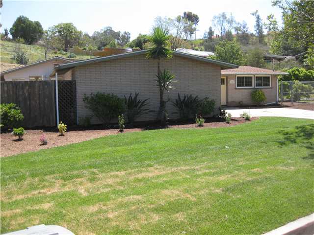 12543 Taunt Road Poway, CA 92064 - Photo 22 of 22 New sod and sprinklers here, on a timer. Note the nice palm and new plants here!