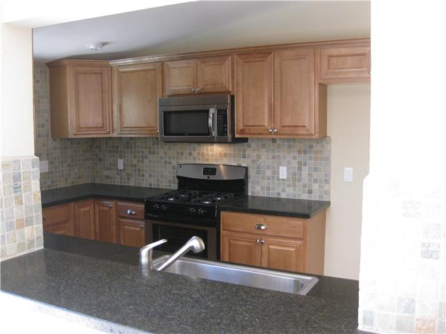 12543 Taunt Road Poway, CA 92064 - Photo 7 of 22 View into kitchen from family room