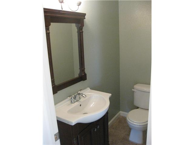12543 Taunt Road Poway, CA 92064 - Photo 8 of 22 Half bath located near living room, and right off of 'extra' room