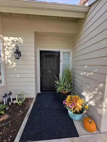 a view of a entryway door of the house