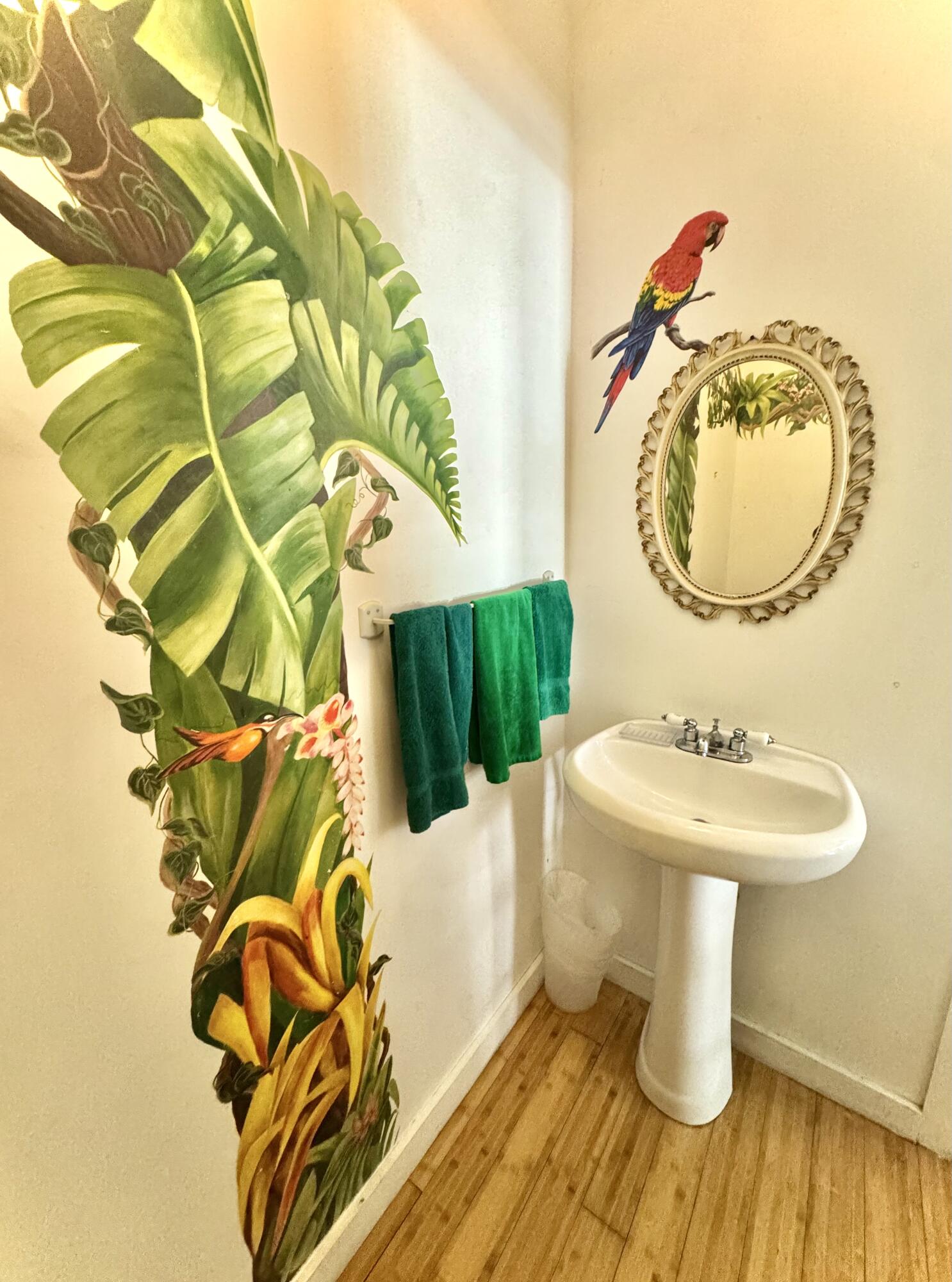 322 Southard Street Key West, FL 33040 - Photo 8 of 35 a bathroom with a sink and mirror
