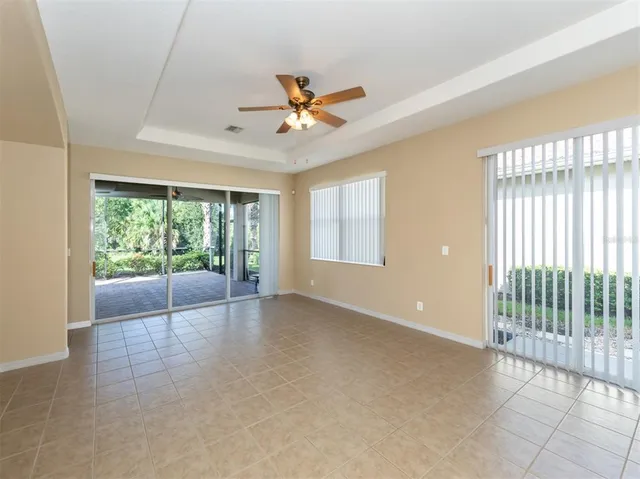 a kitchen with stainless steel appliances granite countertop a refrigerator a sink and a stove