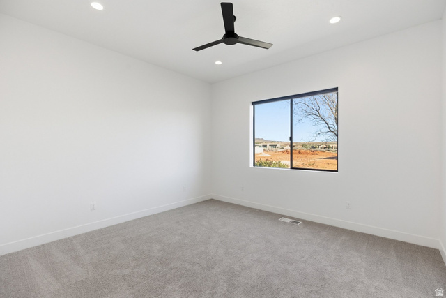 2197 Reserve Circle St. George, UT 84770 - Photo 44 of 57 Empty room featuring light colored carpet, recessed lighting, and ceiling fan
