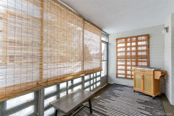 a view of a large kitchen with a large window