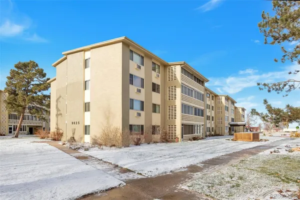 a view of a building with a street
