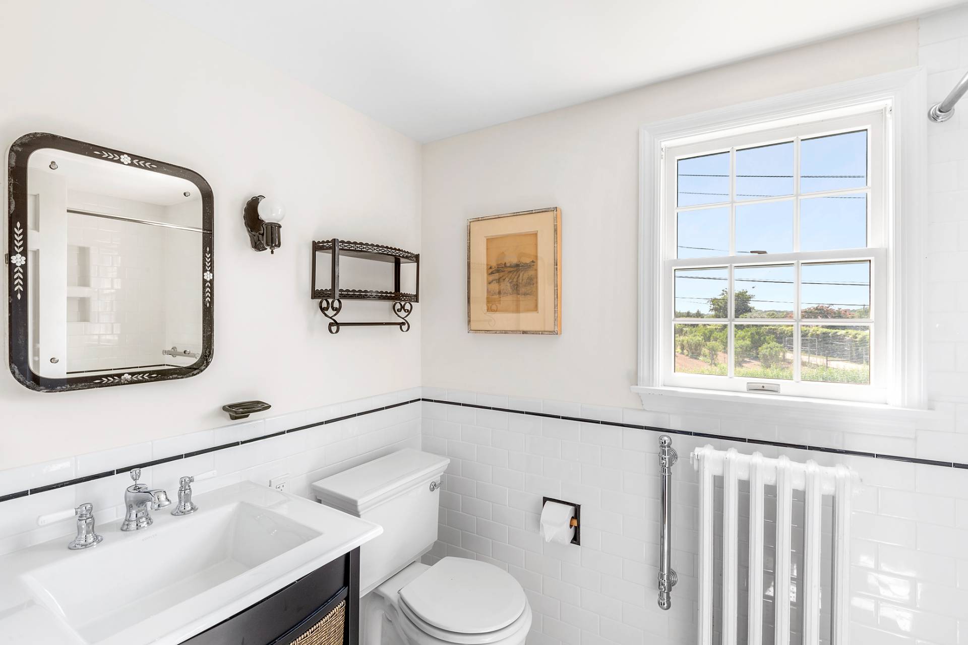 406 Hayground Road Water Mill, NY 11976 - Photo 14 of 20 a bathroom with a sink a toilet and mirror