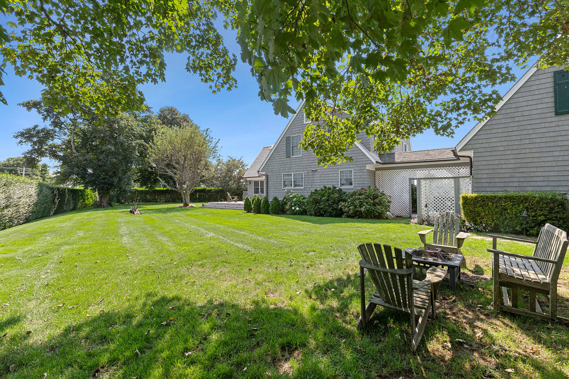 406 Hayground Road Water Mill, NY 11976 - Photo 20 of 20 a view of a house with backyard and sitting area