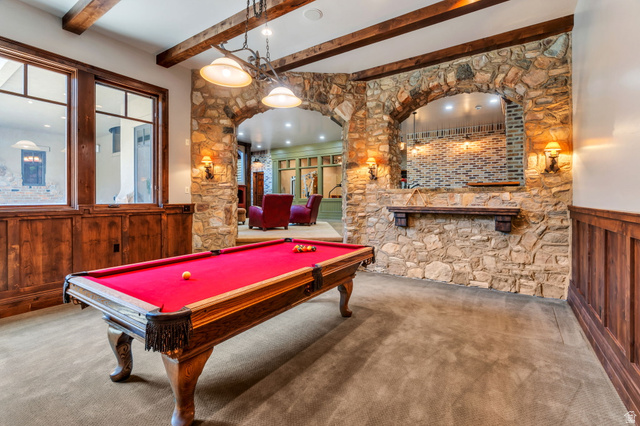 811 South High Ridge Drive Alpine, UT 84004 - Photo 40 of 98 Playroom with wainscoting, arched walkways, wooden walls, billiards, and beam ceiling