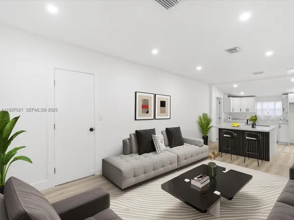 a living room with furniture and a couch