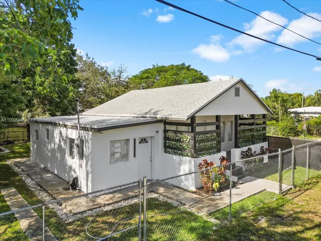 a front view of a house with a porch