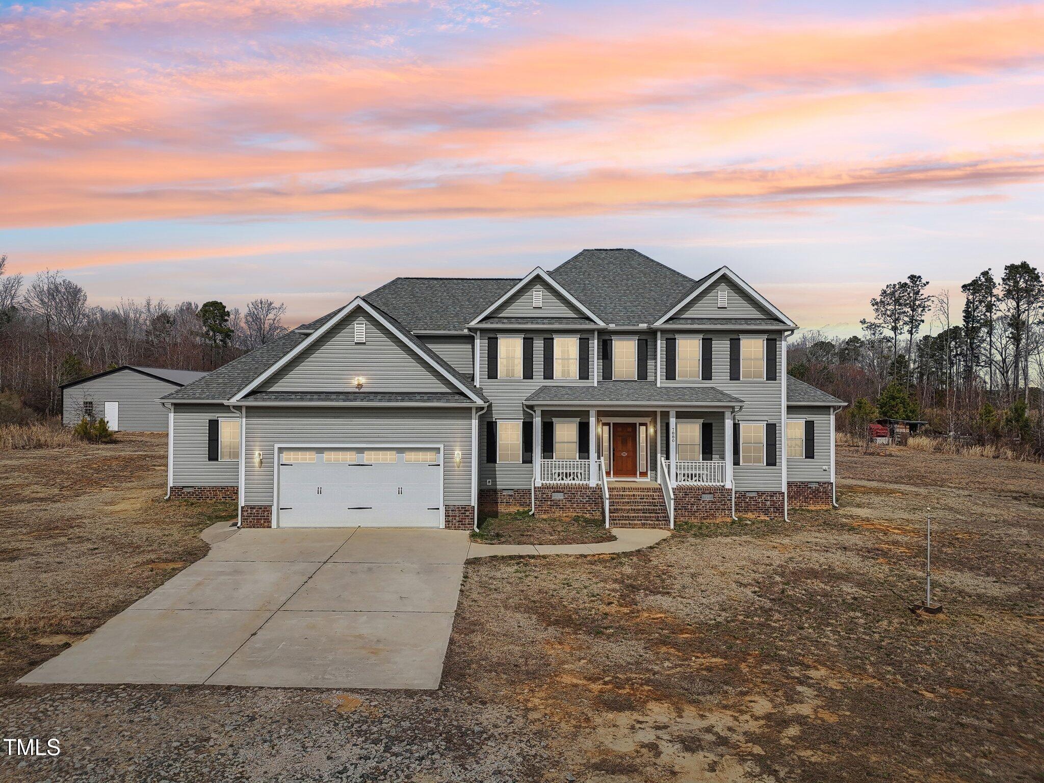 7880 Flower Hill Road Middlesex, NC 27557 - Photo 2 of 45 front view of a house with a yard