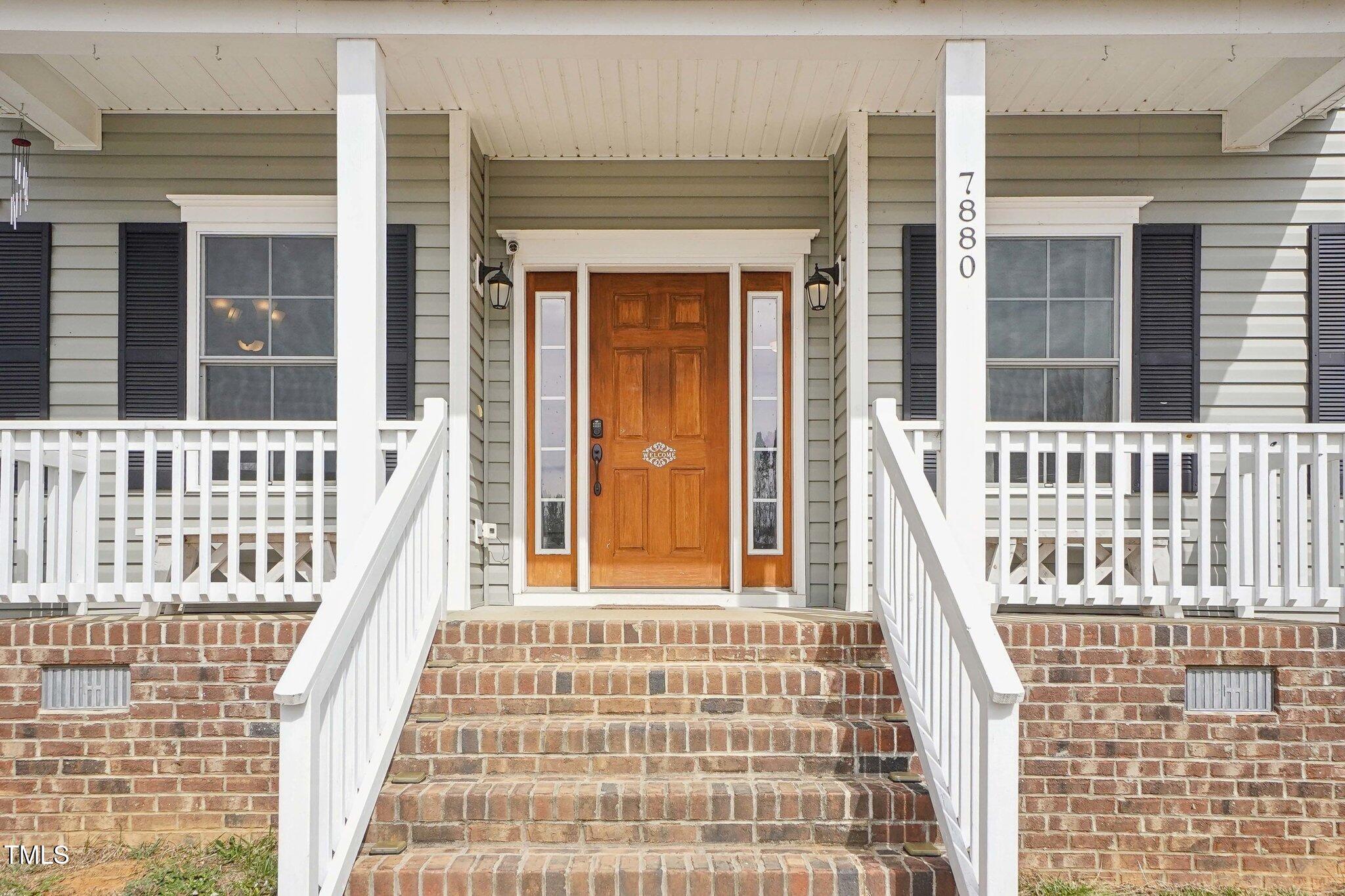 7880 Flower Hill Road Middlesex, NC 27557 - Photo 3 of 45 front view of a brick house