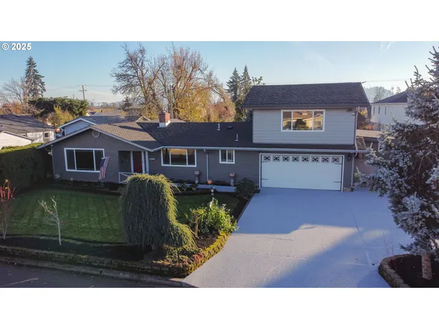 a black and white photo of a house