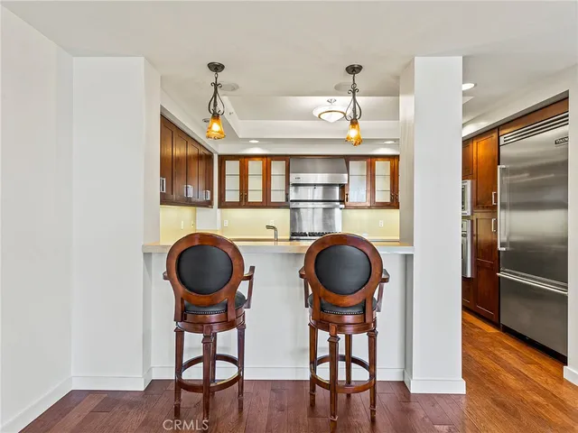 a kitchen with a stove and a sink