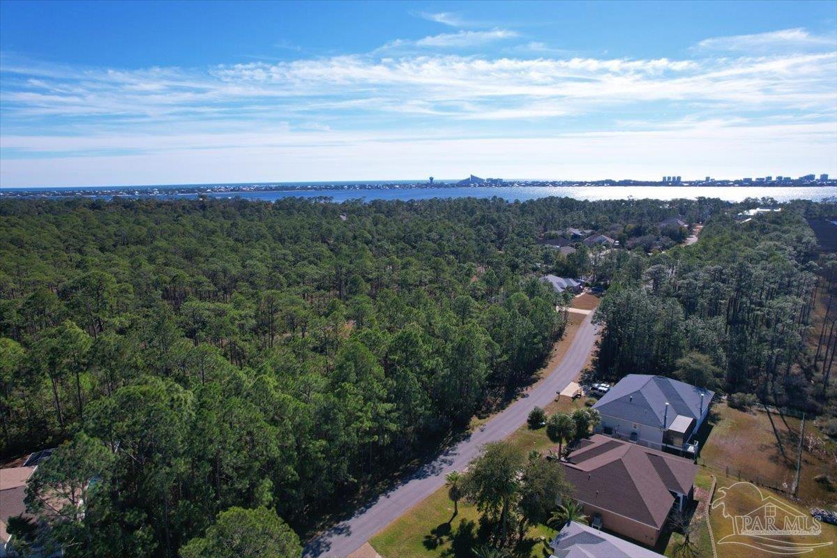 5433 North Shore Road Pensacola, FL 32507 - Photo 13 of 28 a view of a city with sunset view