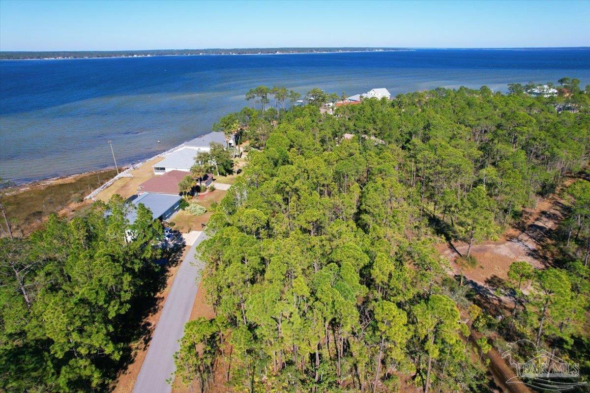 5433 North Shore Road Pensacola, FL 32507 - Photo 15 of 28 a view of a lake with a yard