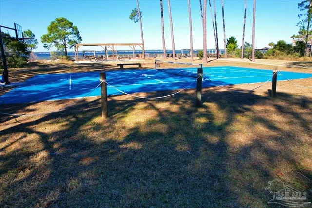 a view of pool with outdoor seating