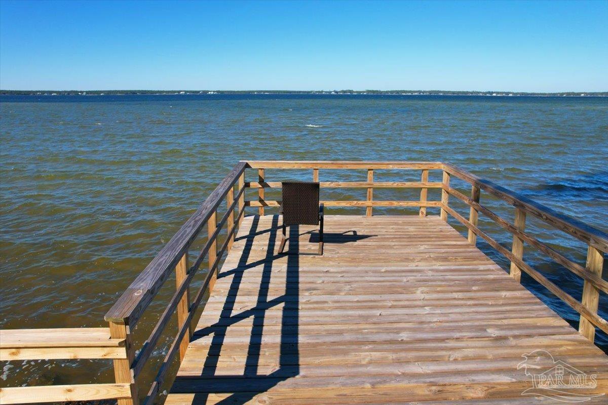 5433 North Shore Road Pensacola, FL 32507 - Photo 26 of 28 a view of ocean from a balcony