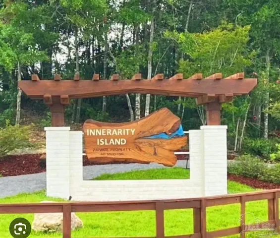 a view of a swimming pool with a yard