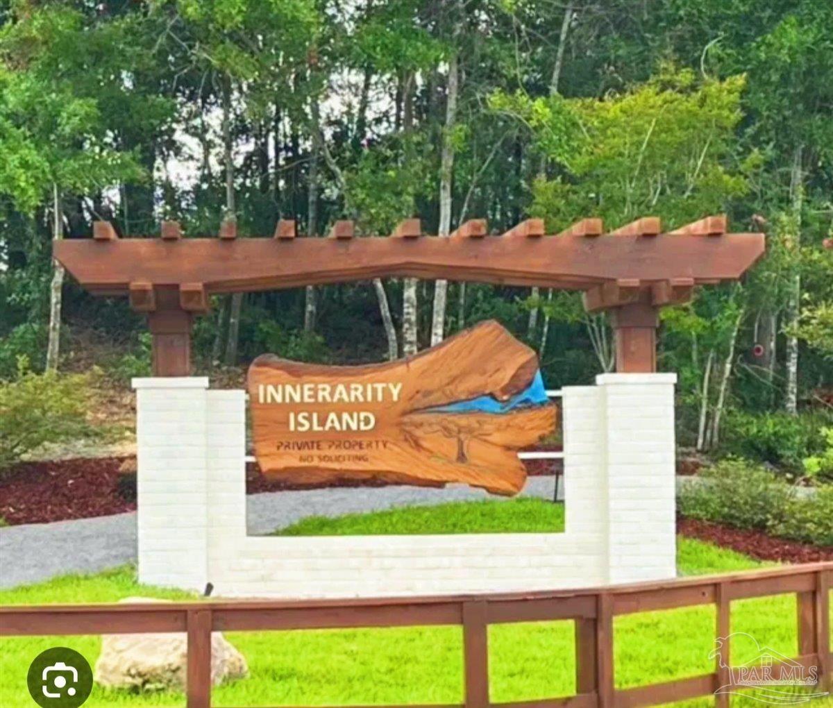 5433 North Shore Road Pensacola, FL 32507 - Photo 27 of 28 a view of outdoor space with a garden