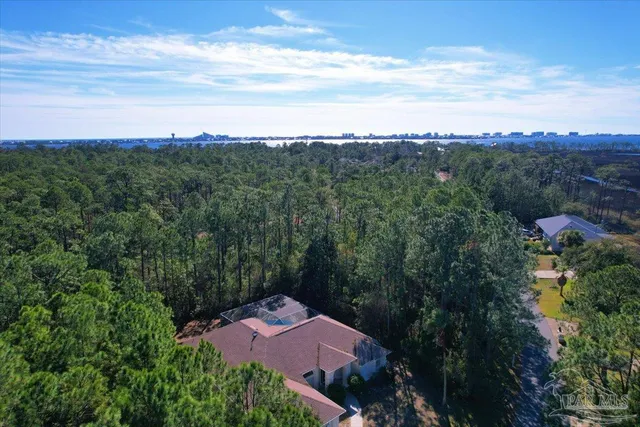 an aerial view of a house with mountain view