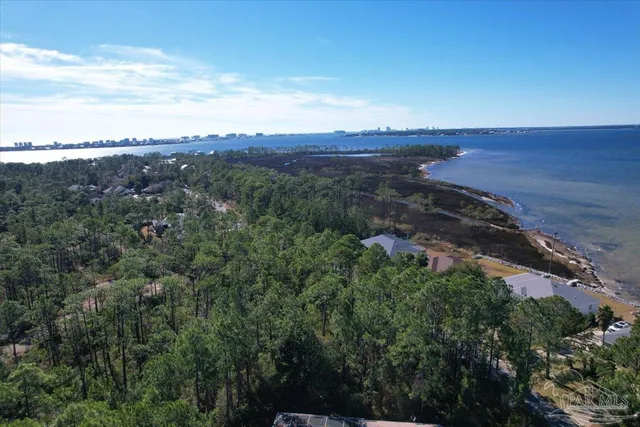 an aerial view of beach and city