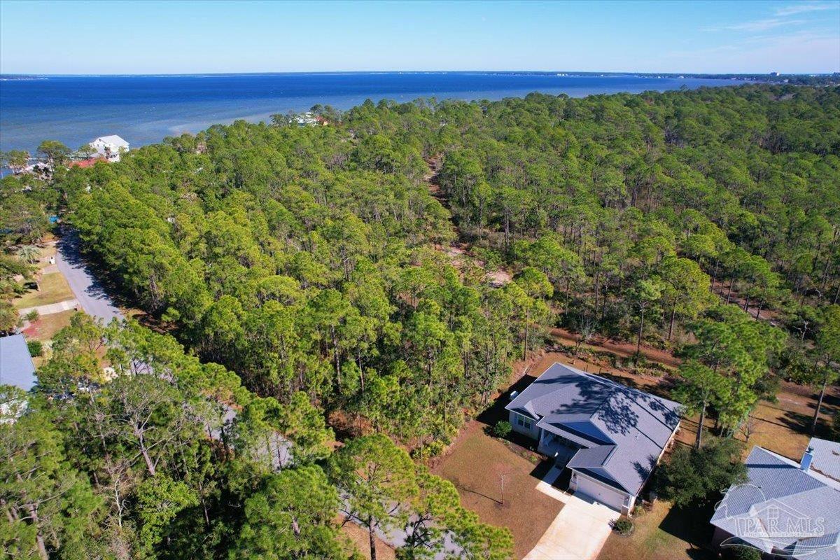 5433 North Shore Road Pensacola, FL 32507 - Photo 10 of 28 an aerial view of a house with a yard