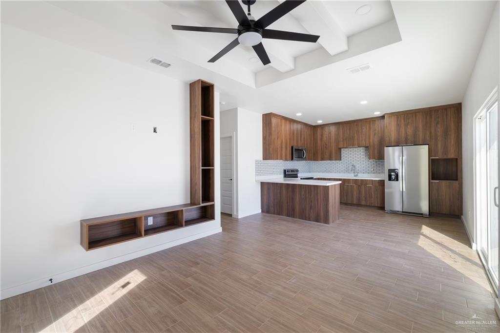 2904 Gabriel Street, Unit 3 Mission, TX 78574 - Photo 13 of 13 a view of a kitchen with a sink and a refrigerator
