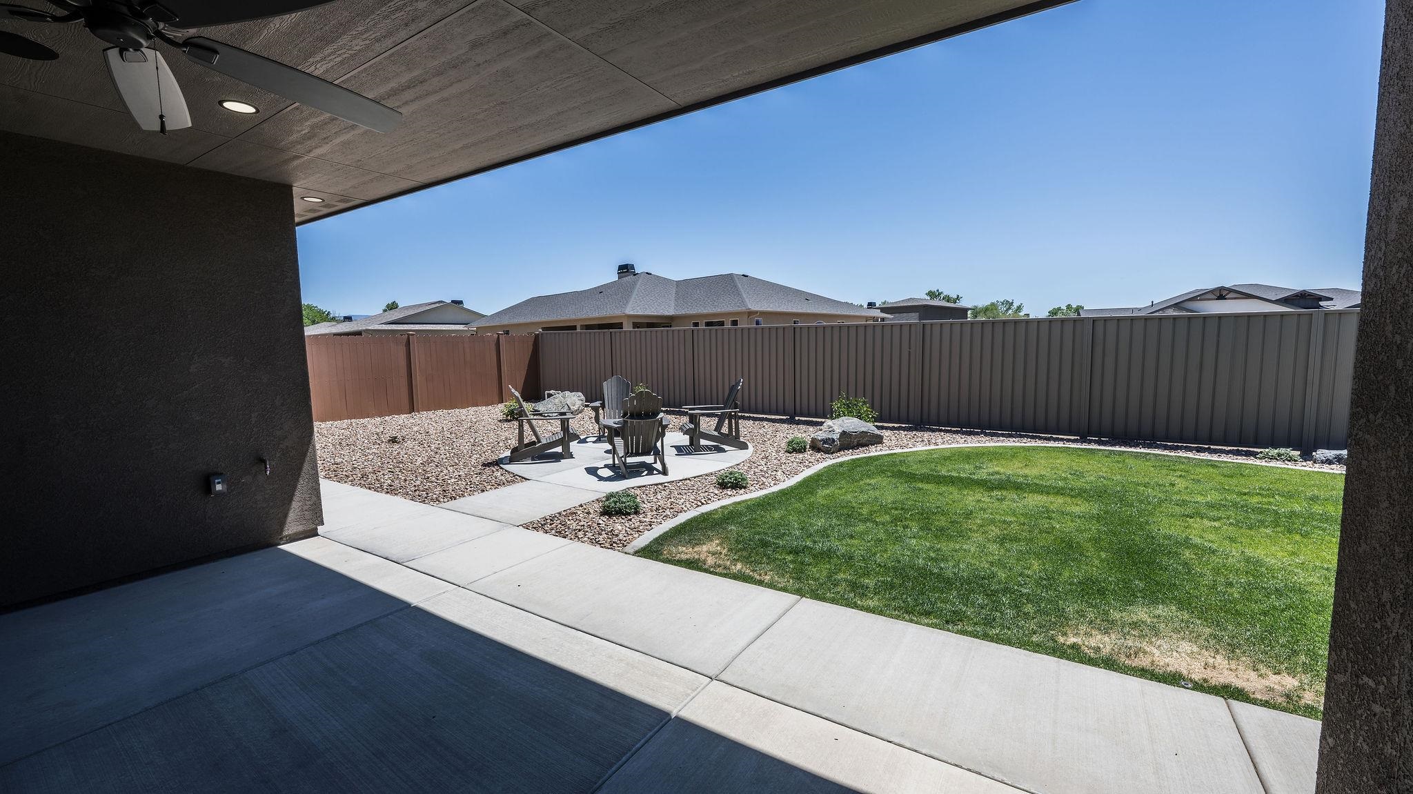 2639 Emerald Ridge Lane Grand Junction, CO 81506 - Photo 36 of 42 a view of a backyard with sitting area