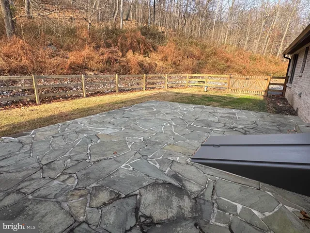 a view of a yard with an outdoor space