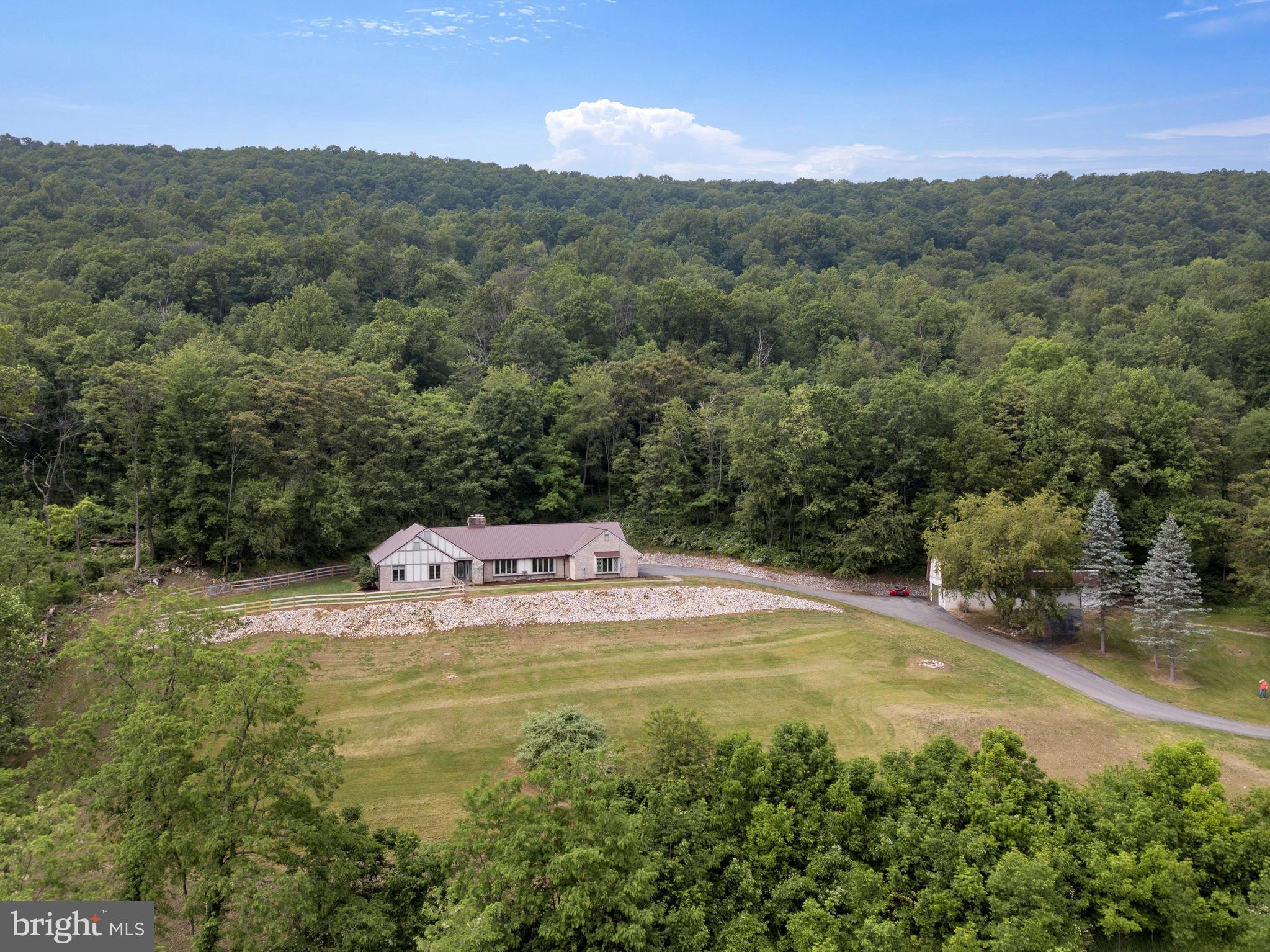 210 Raintree Lane Fairfield, PA 17320 - Photo 22 of 23 a view of a house with a yard