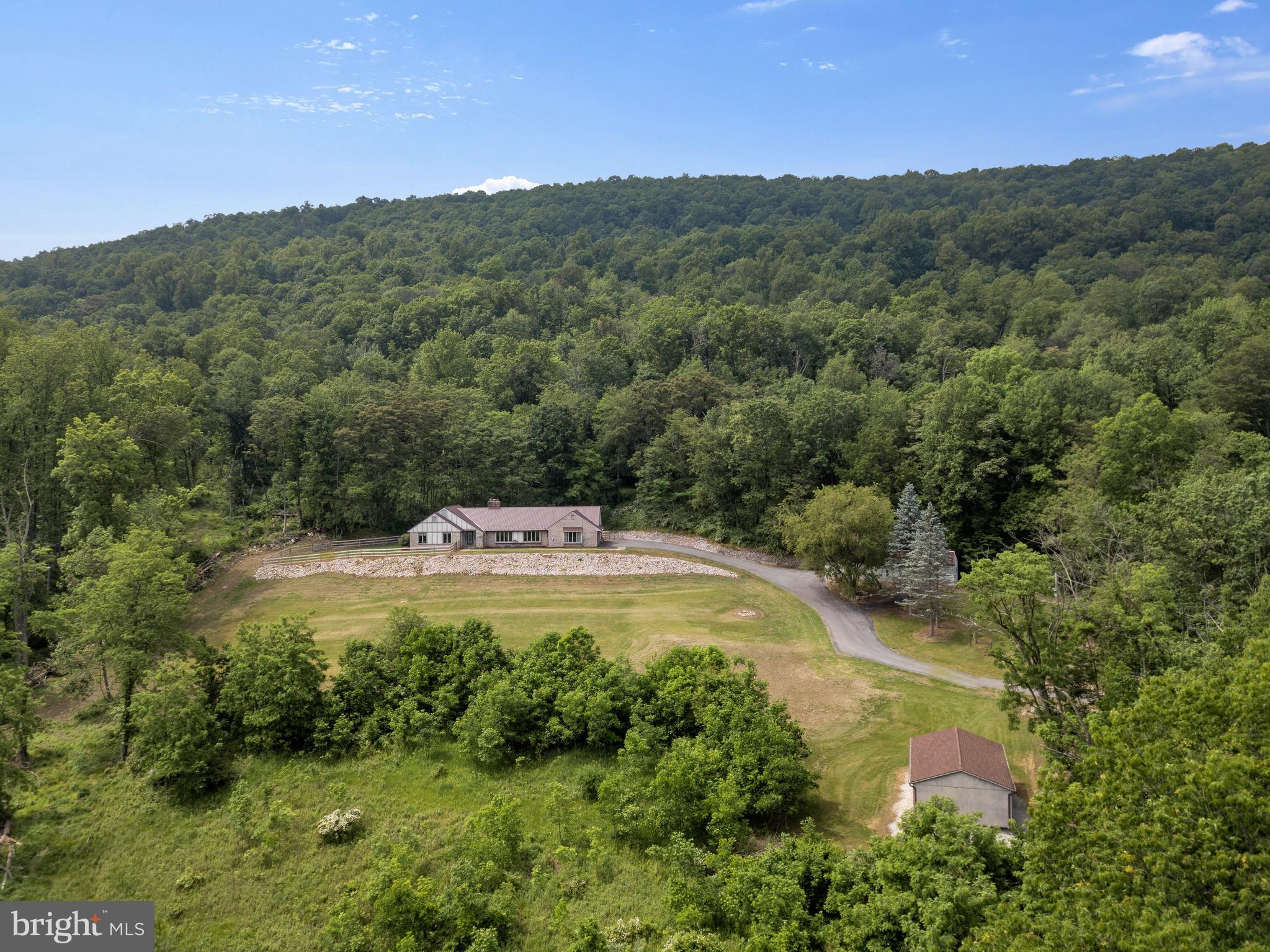 210 Raintree Lane Fairfield, PA 17320 - Photo 23 of 23 a view of a grassy area with an trees