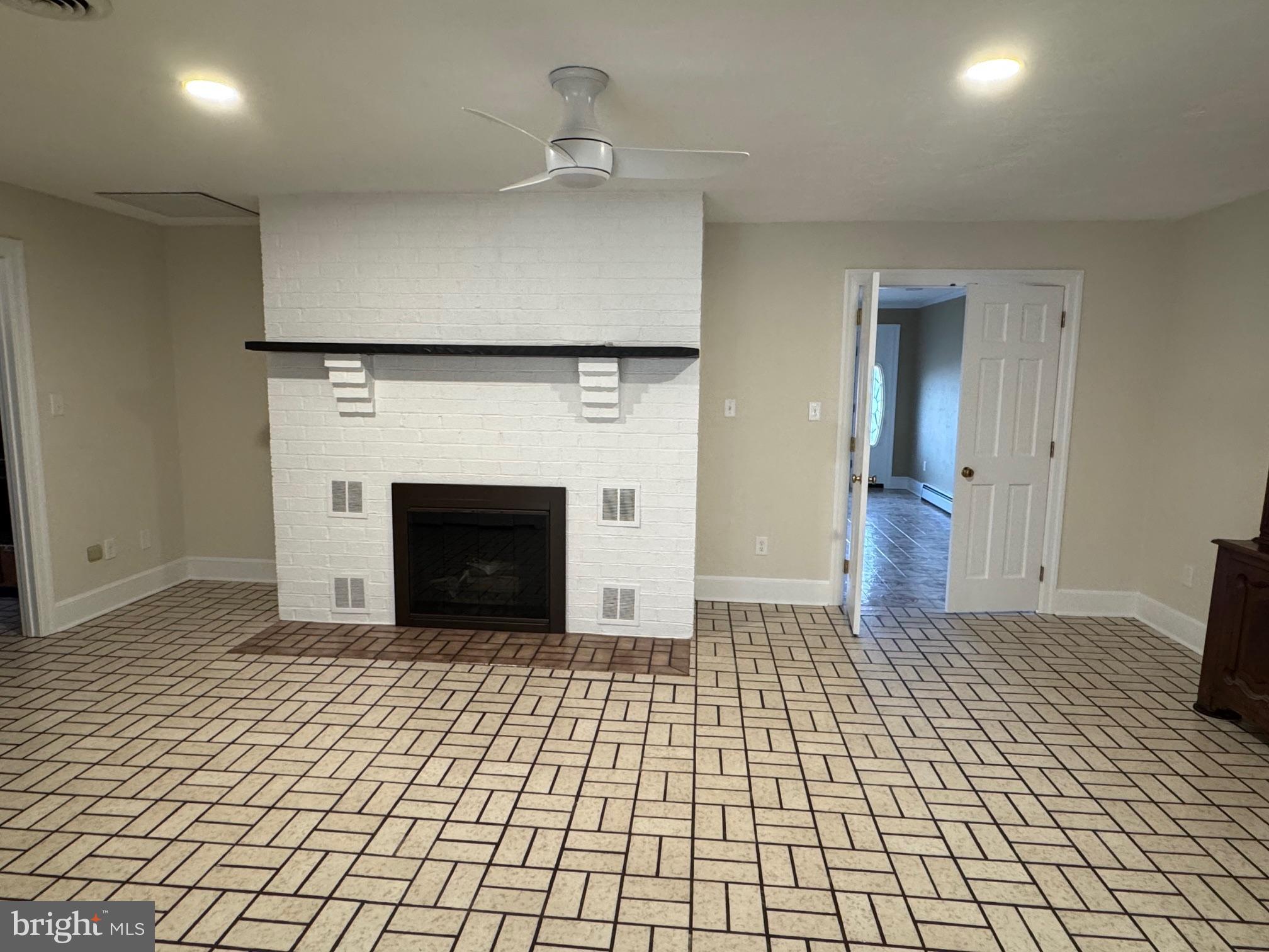210 Raintree Lane Fairfield, PA 17320 - Photo 8 of 23 a view of empty room with wooden floor
