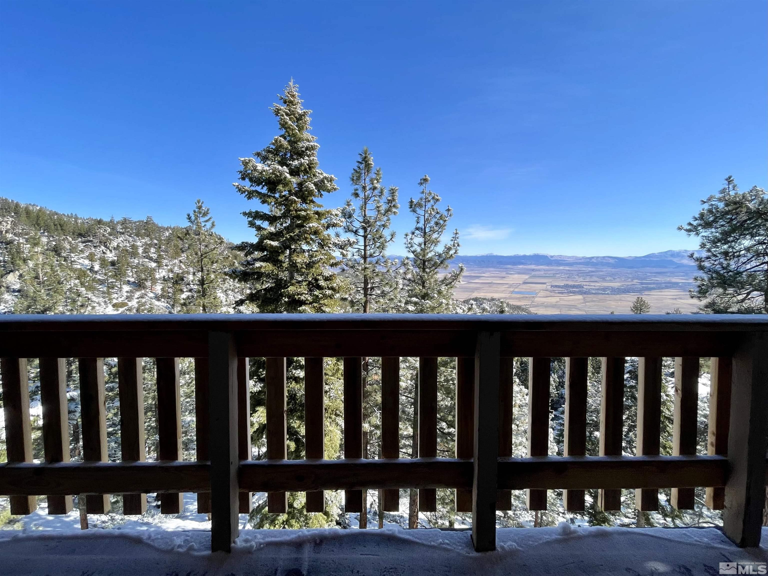 261 Quaking Aspen Lane, Unit B Stateline, NV 89449 - Photo 2 of 40 a view of a street from a balcony