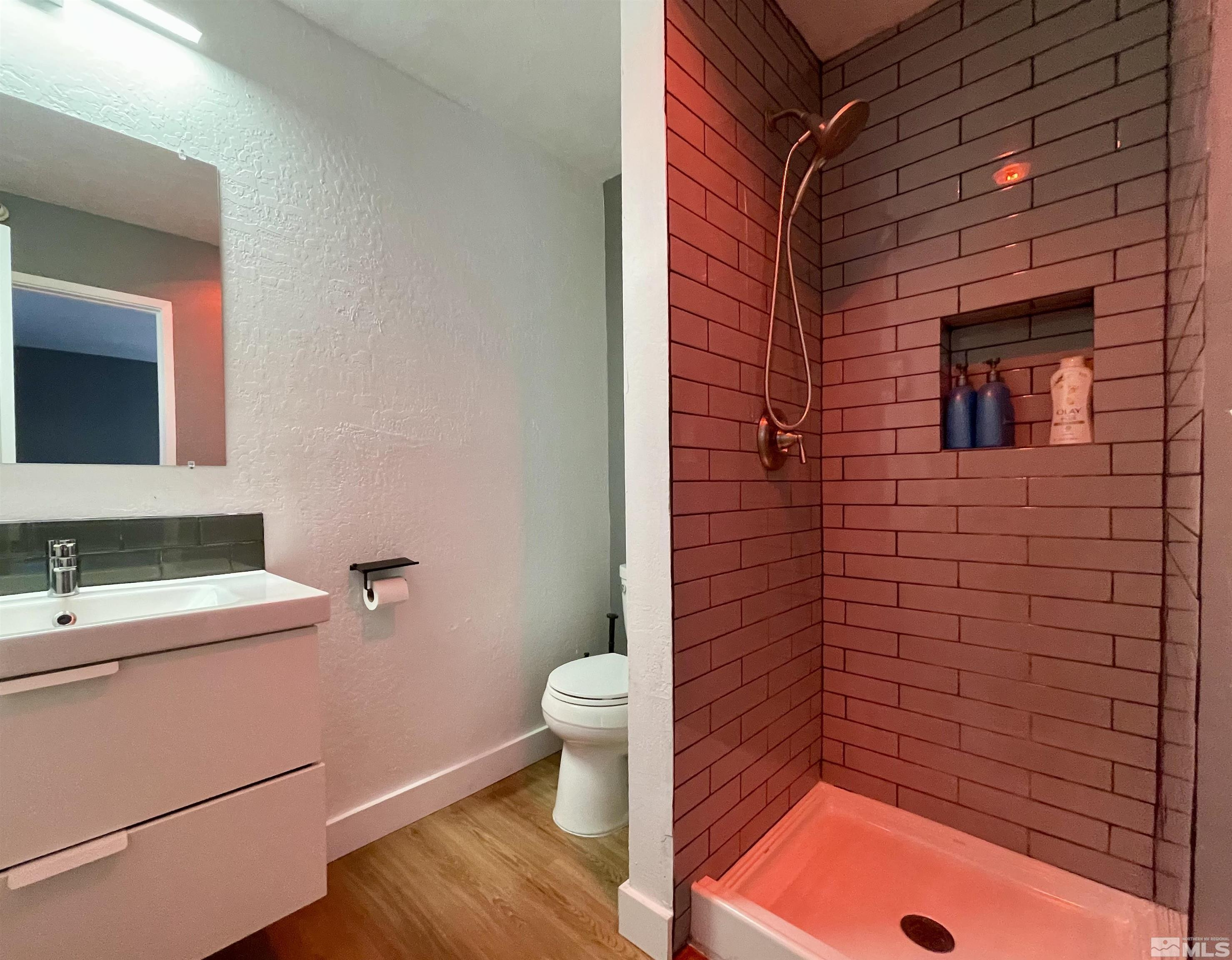 261 Quaking Aspen Lane, Unit B Stateline, NV 89449 - Photo 31 of 40 a bathroom with a sink and a toilet
