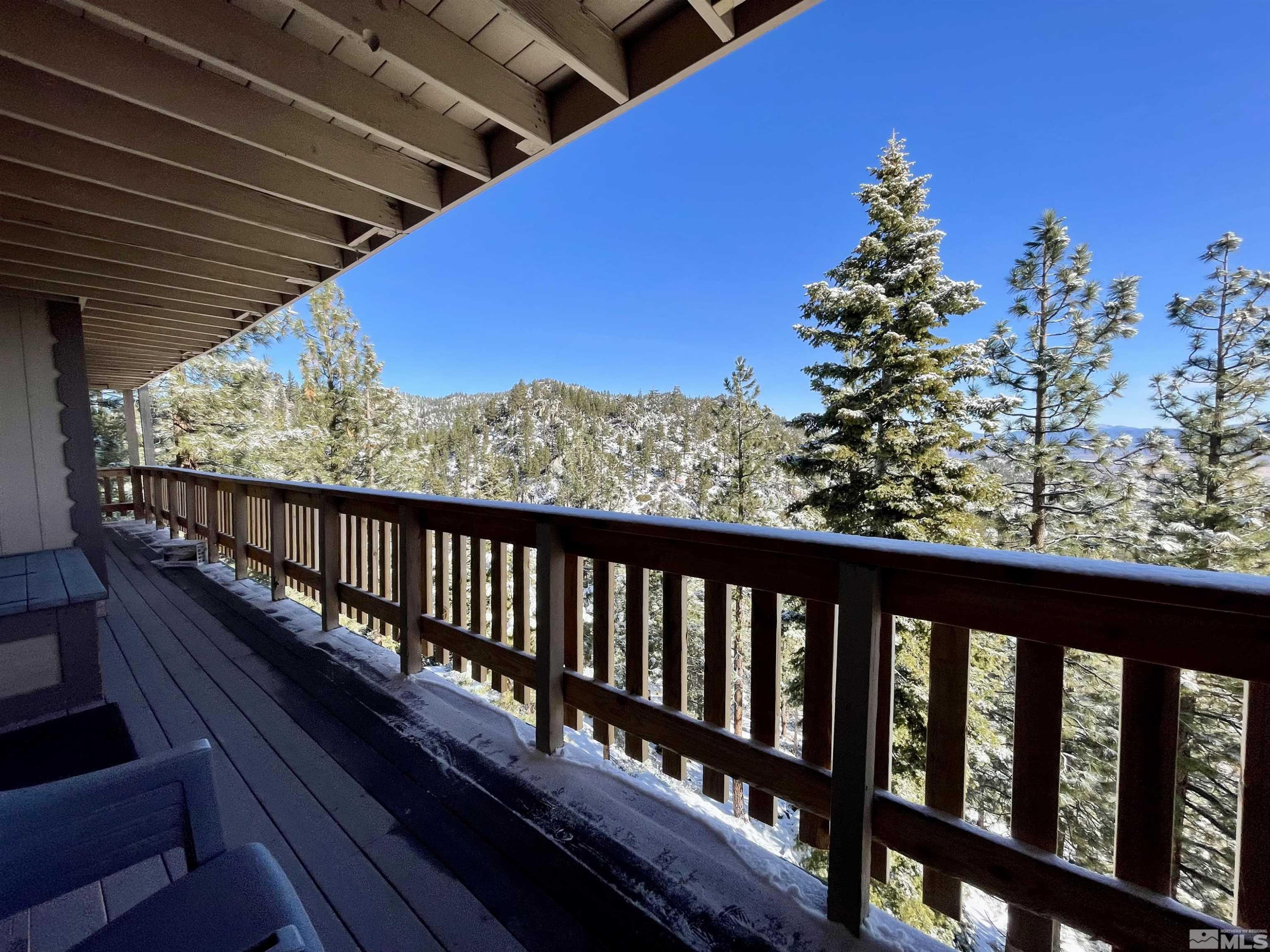 261 Quaking Aspen Lane, Unit B Stateline, NV 89449 - Photo 7 of 40 a view of a balcony with a swing