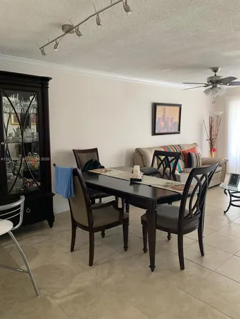 a view of a livingroom with furniture and a table