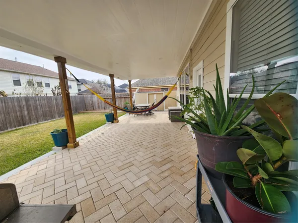 a view of a porch with chairs