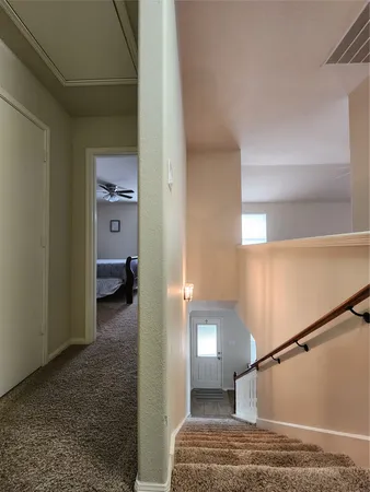 a view of a room with a flat screen tv