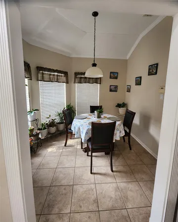 a view of a livingroom with furniture and window