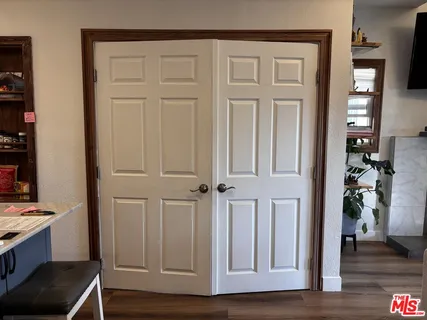 a view of livingroom with furniture and wooden floor