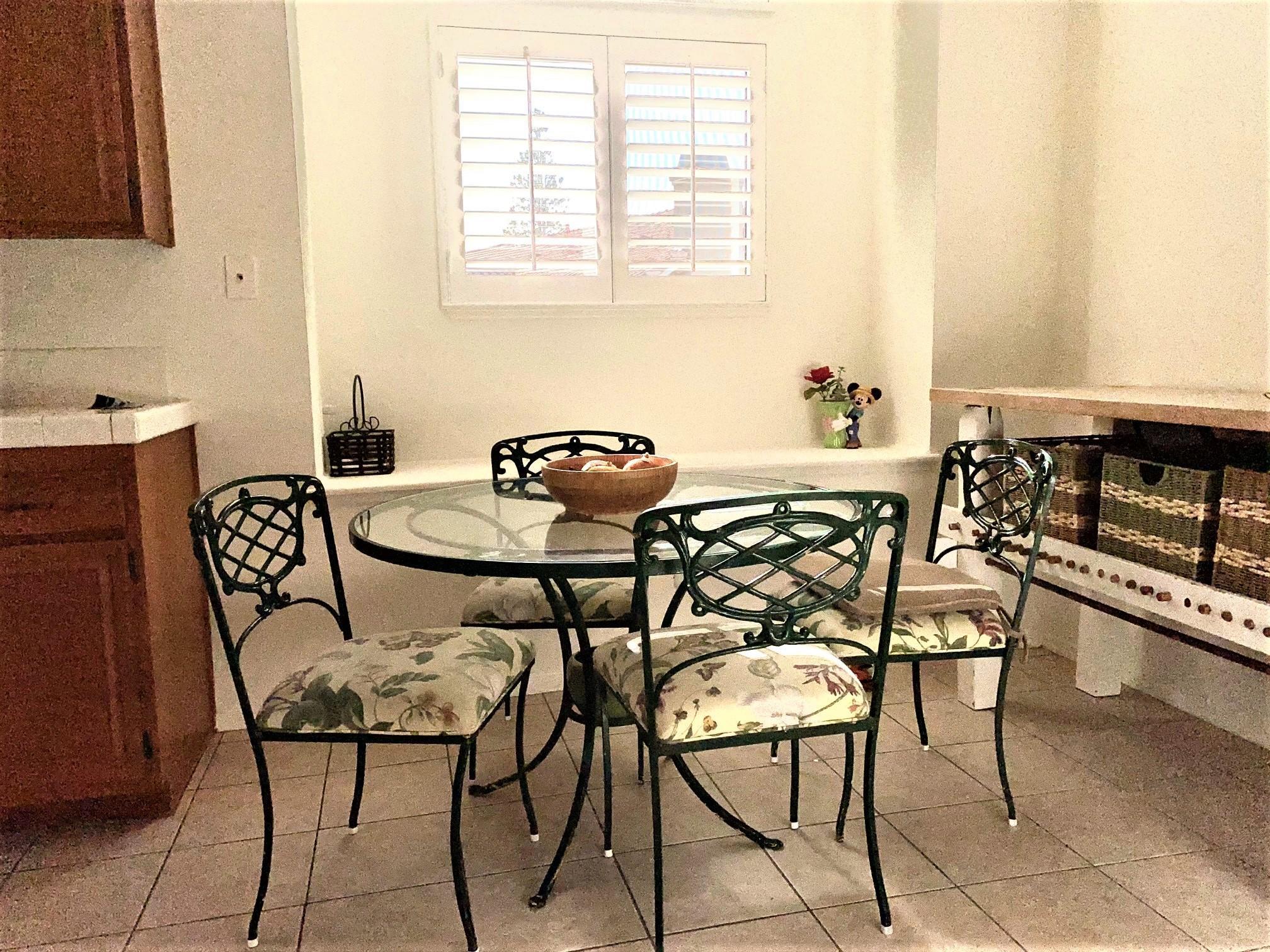 290 Ridgeton Lane, Unit B Simi Valley, CA 93065 - Photo 12 of 25 a dining room with furniture and window
