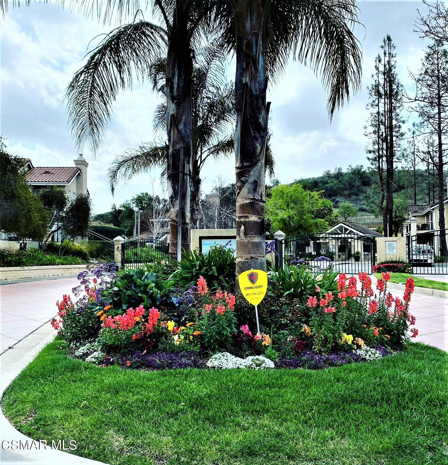 290 Ridgeton Lane, Unit B Simi Valley, CA 93065 - Photo 3 of 25 a view of a flowers in front of house