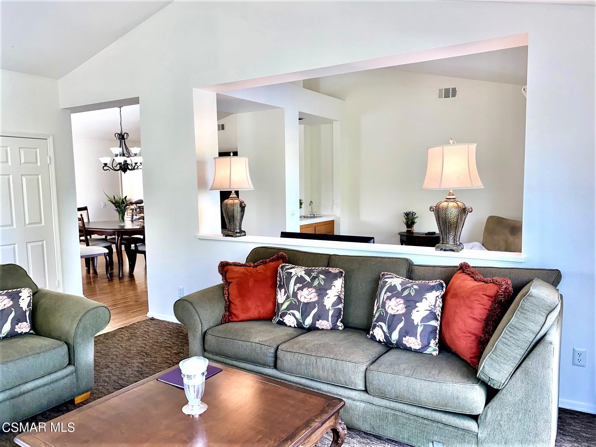 290 Ridgeton Lane, Unit B Simi Valley, CA 93065 - Photo 6 of 25 a living room with furniture and a lamp