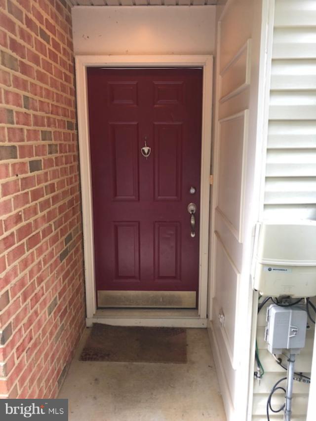 27 Bank Spring Court Owings Mills, MD 21117 - Photo 2 of 27 a view of front door of house