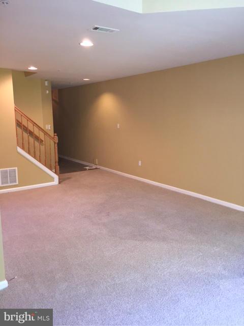 27 Bank Spring Court Owings Mills, MD 21117 - Photo 4 of 27 a view of an empty room with a window