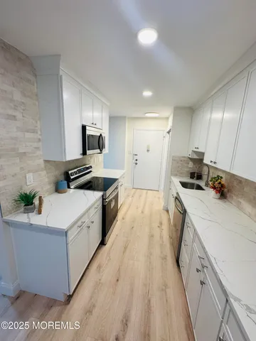 a large kitchen with a lot of counter space