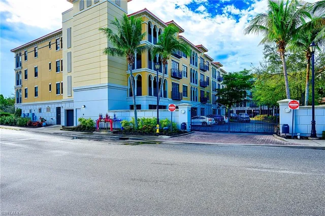 a room with gym equipment and large mirror